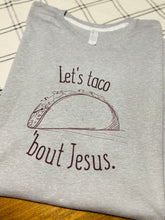 Load image into Gallery viewer, Let’s Taco ‘Bout Jesus Tee
